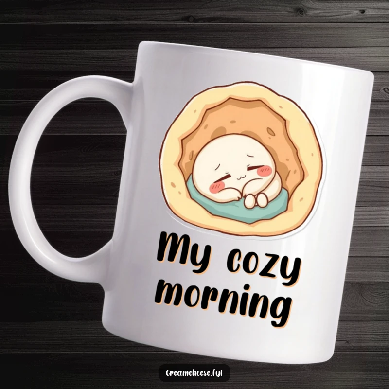 Funny Mug: Content cream cheese character peacefully napping inside a small, soft, doughy hole.