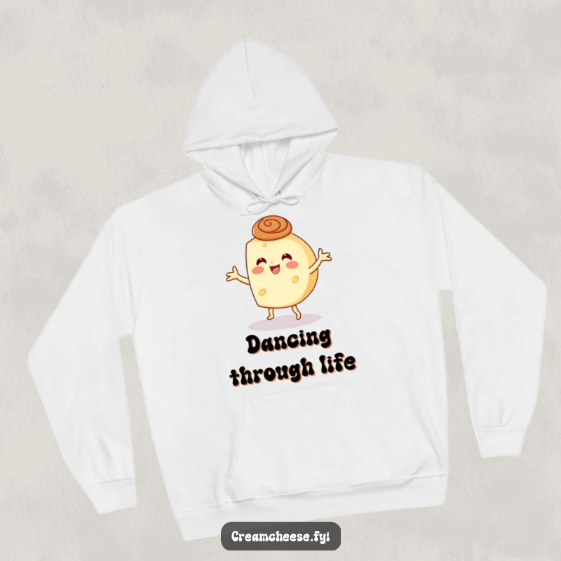 Funny animated cream cheese wheel joyfully dancing with a cinnamon swirl hat, featured on a cozy hoodie.