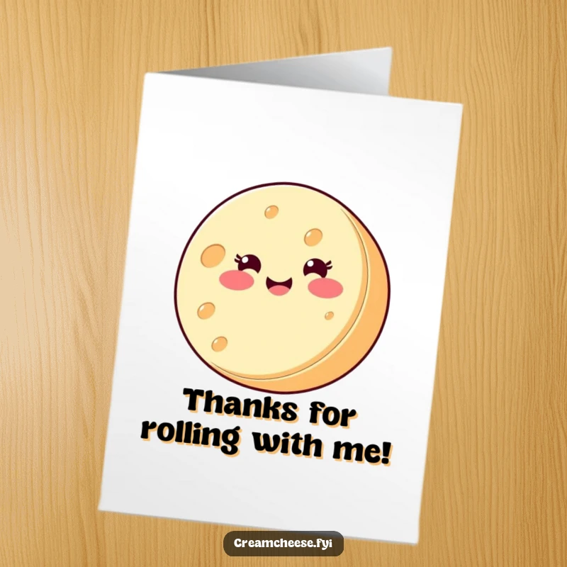 Funny Free Printable Thank You Card: A round cream cheese wheel with a smiling face spins joyfully on its side to express thanks.