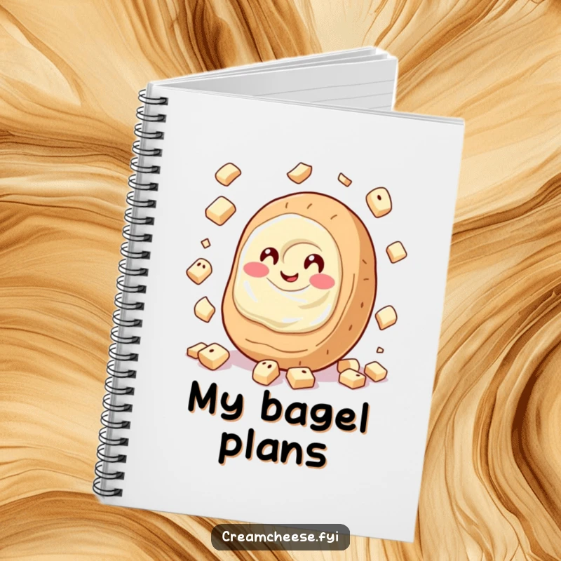 Funny Cream Cheese Notebook with a giggling cream cheese spread juggling tiny bagel pieces, perfect for jotting down ideas with a smile.