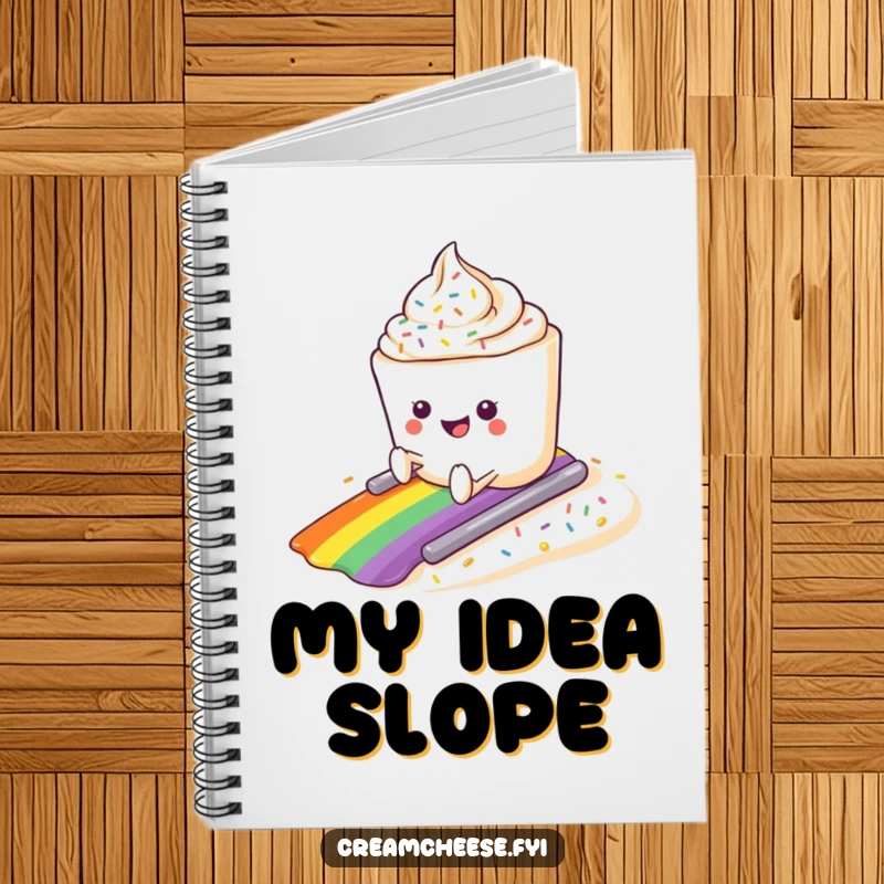 Funny cream cheese tub sliding down a rainbow sprinkle slope on a notebook cover, designed for creative minds.