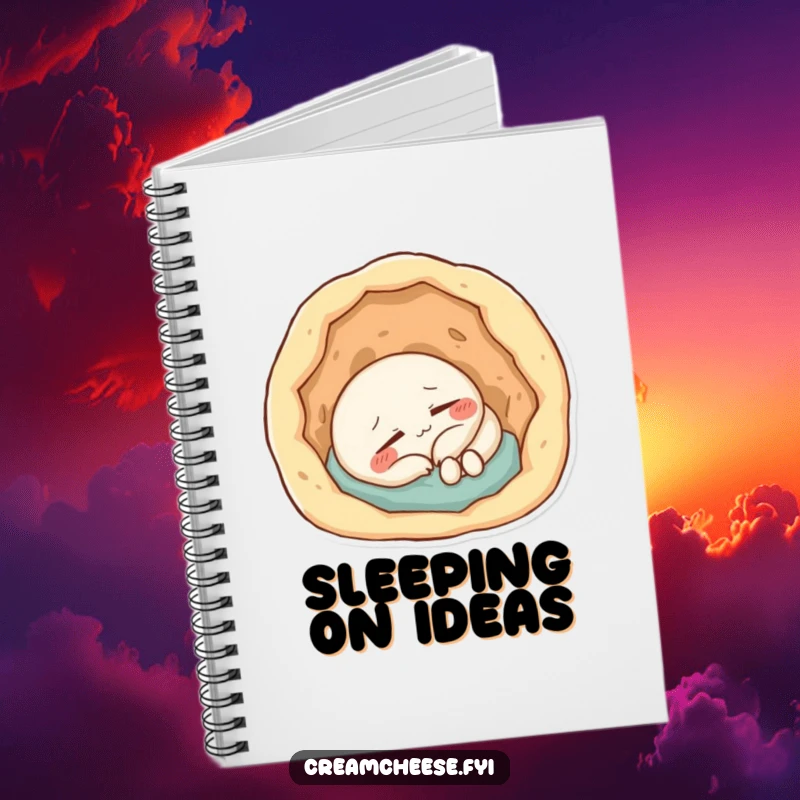 Funny Notebook: Content cream cheese character napping soundly inside a small doughy hole, ideal for notes.