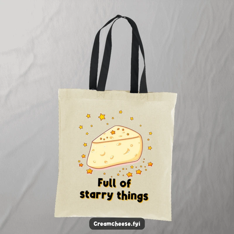 Funny Cream Cheese Stars Tote Bag: A cream cheese wedge gleefully scatters tiny edible golden stars, a magical and practical carryall.